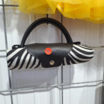 Black-and-white zebra print clutch handbag