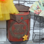 Red North Pole mailbox with yellow star