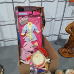 Barbie robe, pink teddy bear, toy drum