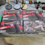 Toy pistol boxes with orange muzzle tips