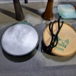Pair of small hand drums on table