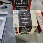 Boxes of .22 LR ammunition on table
