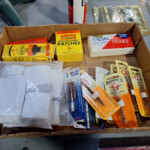 Gun cleaning kit with patches and brushes