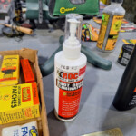 Shoe odor eliminator bottle on workbench