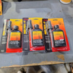 Three packaged Red Fox-P bottles on table