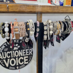 Assorted beaded bracelets on display rack