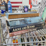 Stack of books on metal shelf