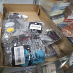 Box of packaged hair accessories on display