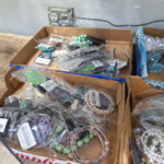 Assorted packaged jewelry in cardboard boxes