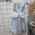 Light blue and silver princess dress hanging