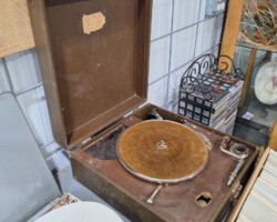Vintage portable record player in open case