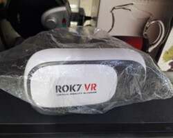 White ROK7 VR headset wrapped in plastic
