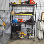 Metal shelving with assorted power tools