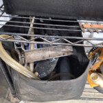 Storage bin with hoses and miscellaneous tools